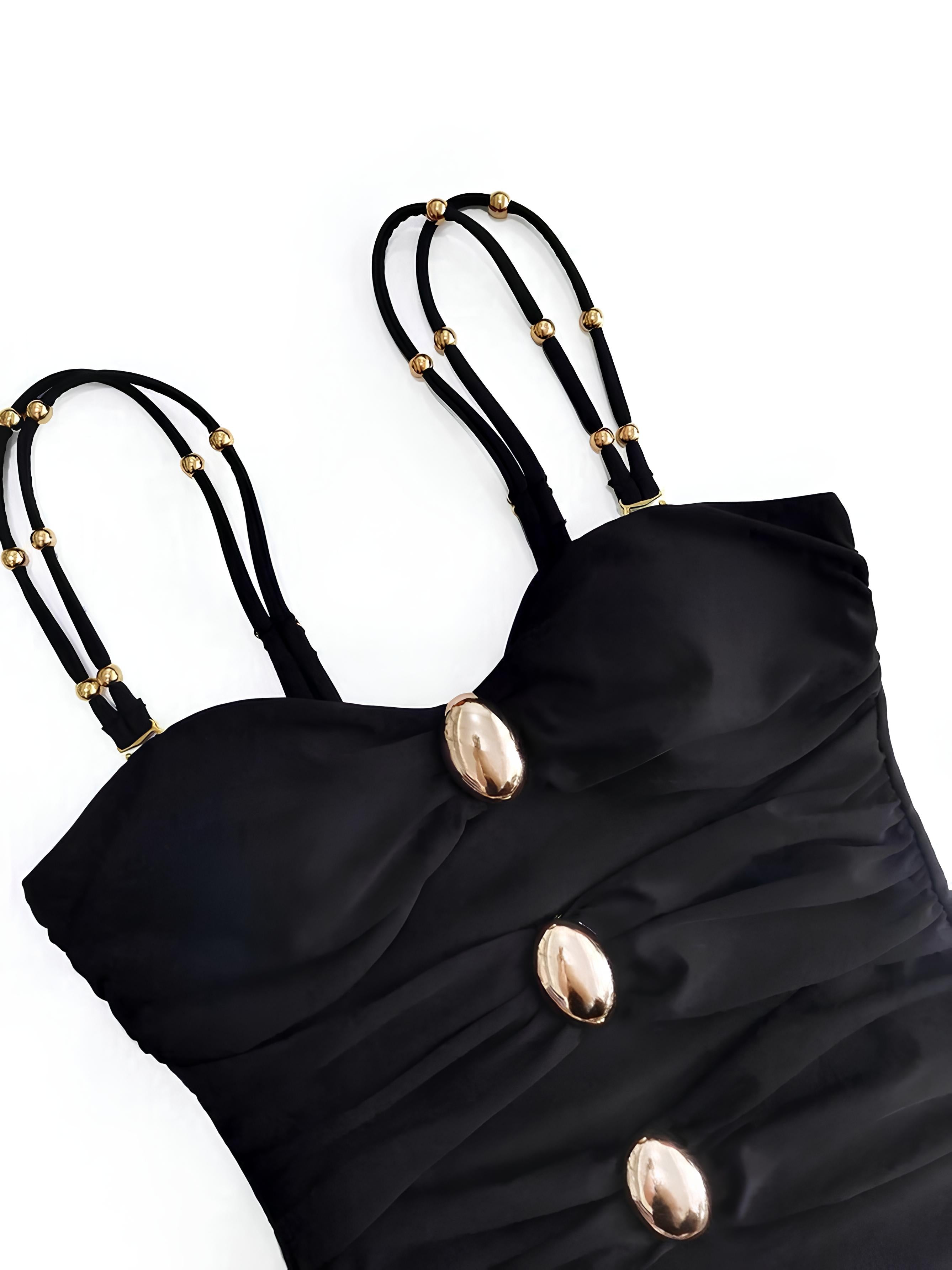 Swimsuit With Contrasting Cutouts And Ring Details