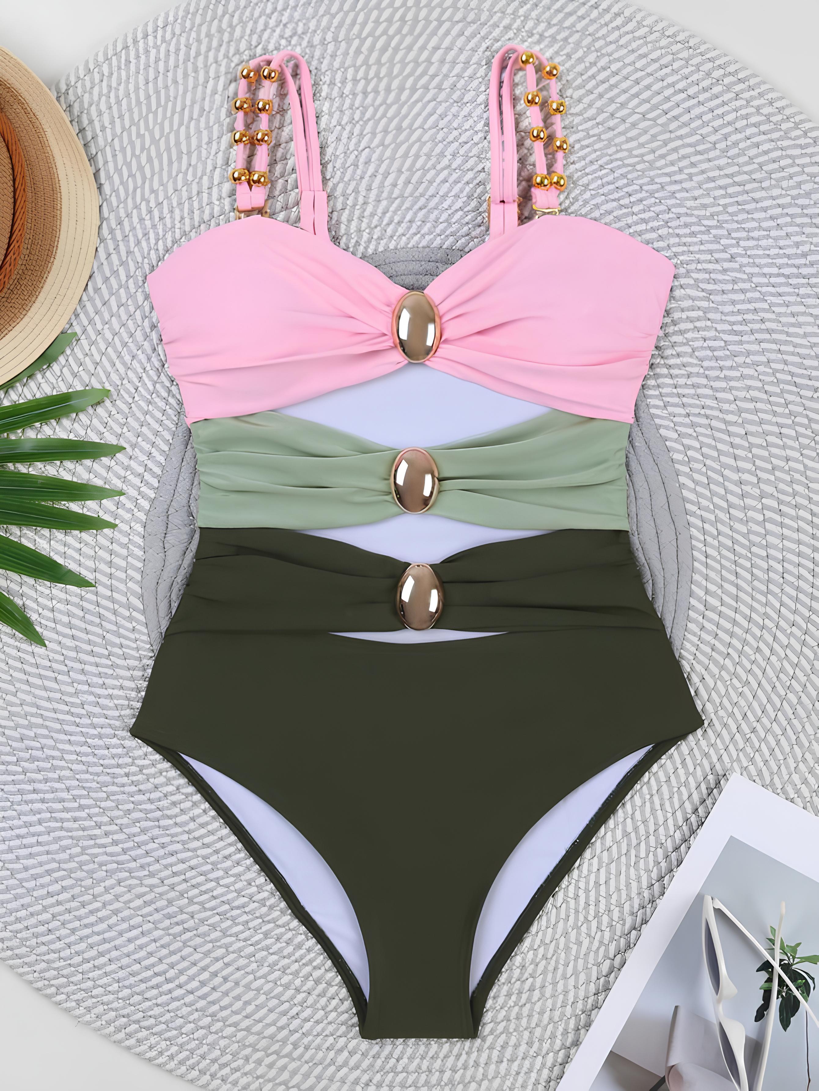 Swimsuit With Contrasting Cutouts And Ring Details