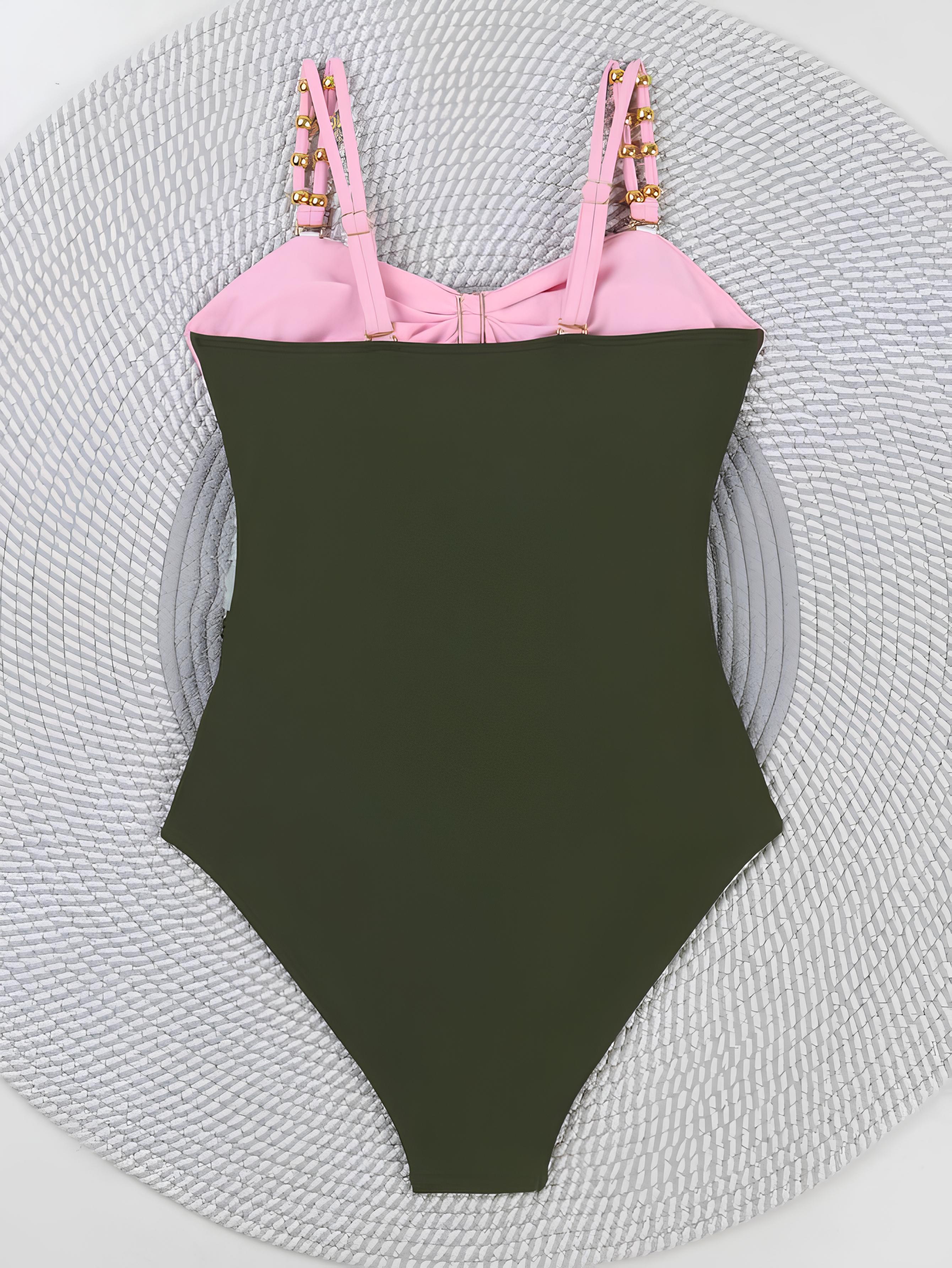 Swimsuit With Contrasting Cutouts And Ring Details