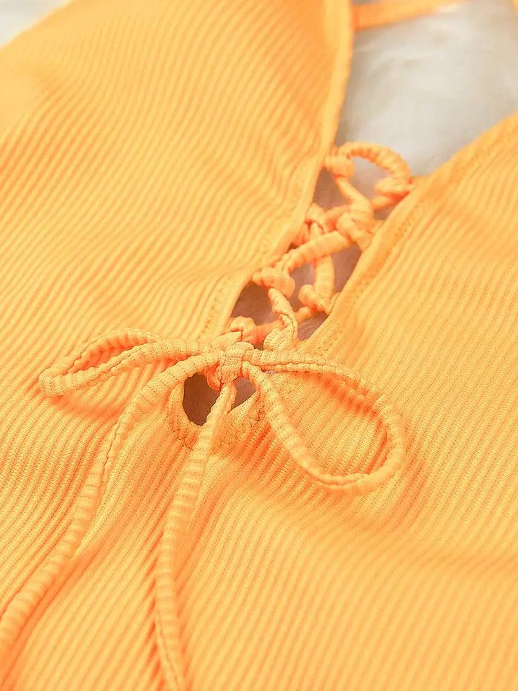 Textured Swimsuit With Deep V-Neckline And Front Tie