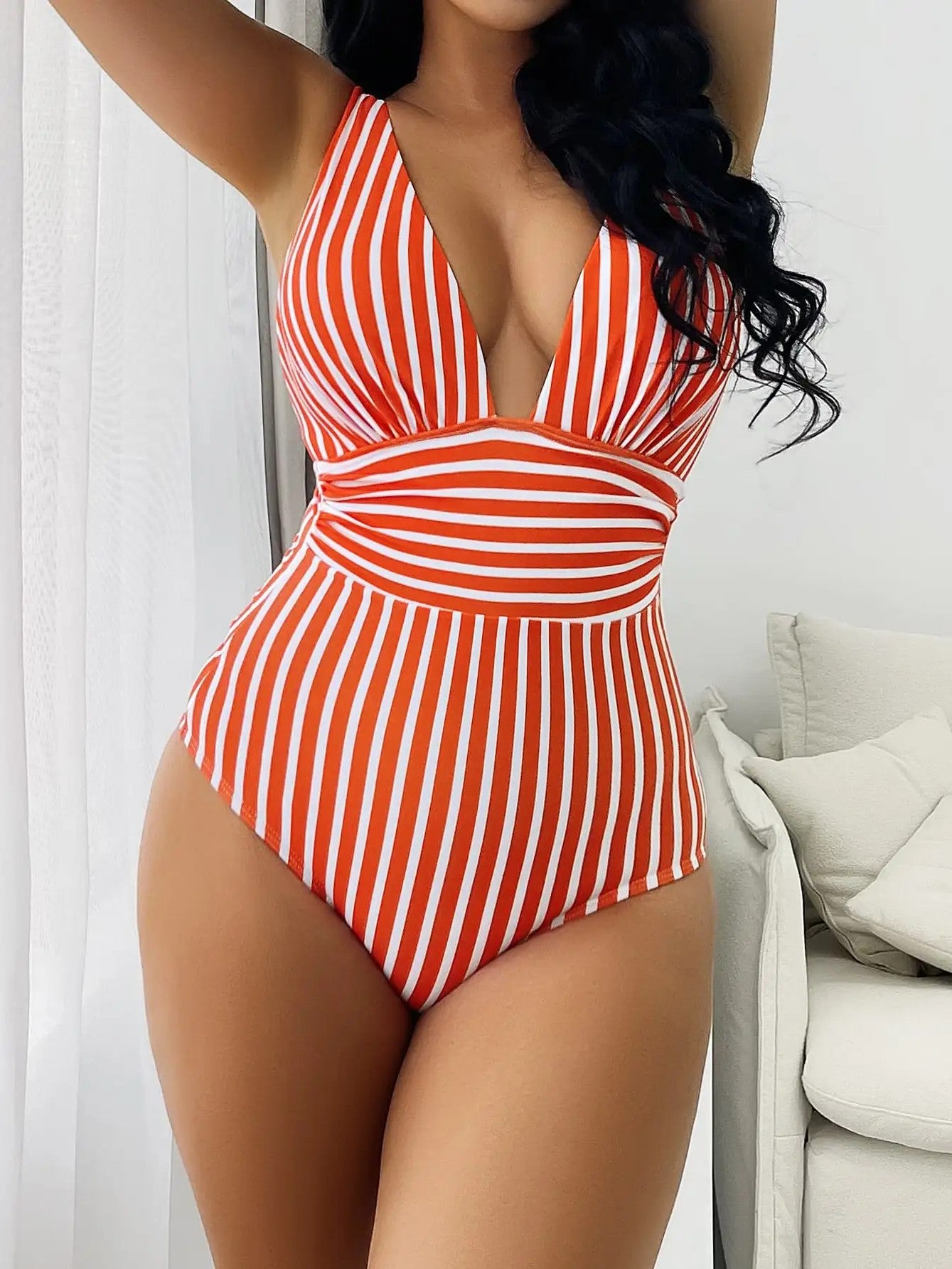 Striped Printed Swimsuit With V-Neckline And Defined Waist