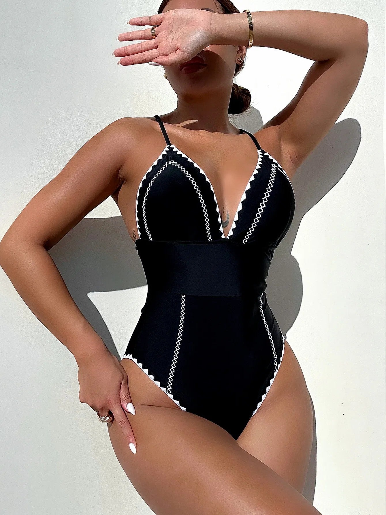 High-Cut Swimsuit With V-Neckline Contrasting Detail And Padding